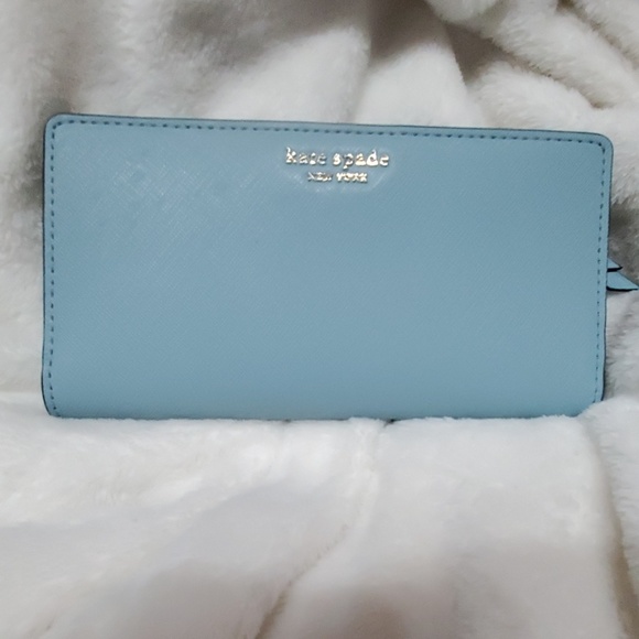 kate spade Handbags - Kate spade bi fold wallet